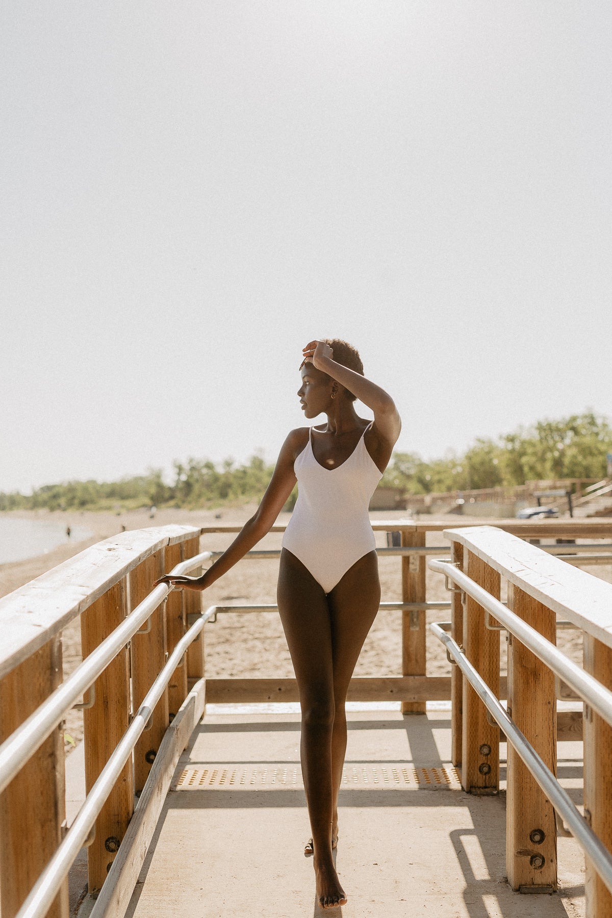 Canadian swimwear brand Prairie Swim classy white low back, deep v neck, curve hugging, one piece swimsuit